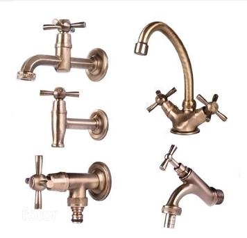 Sink mixer tap for hot and cold water with cross handles